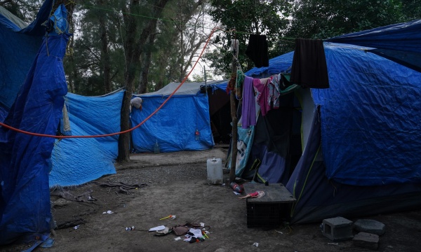 Abandoned tents remain at the migrant camp in Matamoros, Mexico, that is at the center of a controversy involving viral images of a flyer encouraging migrants to vote for President Biden.
